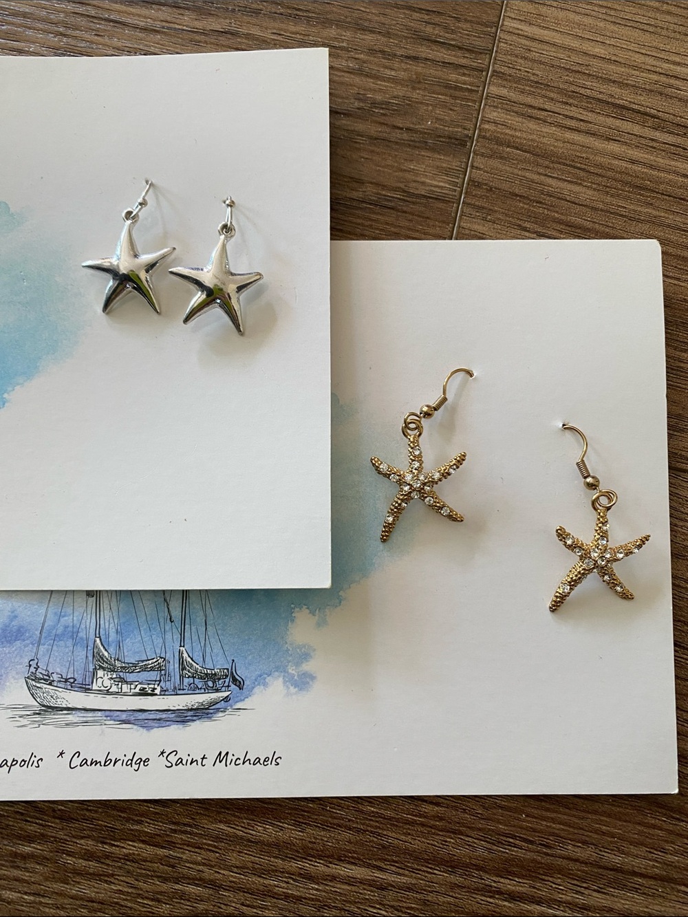 2 Chesapeake bliss silver and gold starfish  earrings.